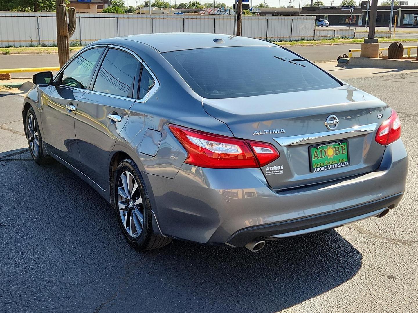 2016 Gun Metallic /Charcoal, cloth Nissan Altima 2.5 SV (1N4AL3AP9GC) with an Engine: 2.5L DOHC 16-Valve 4-Cylinder engine, located at 4711 Ave Q, Lubbock, TX, 79412, (806) 687-2362, 33.551304, -101.855293 - Photo#2