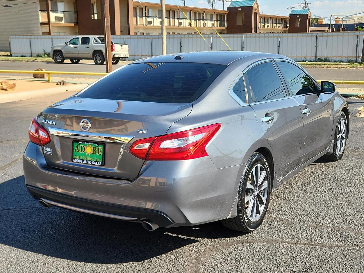 2016 Gun Metallic /Charcoal, cloth Nissan Altima 2.5 SV (1N4AL3AP9GC) with an Engine: 2.5L DOHC 16-Valve 4-Cylinder engine, located at 4711 Ave Q, Lubbock, TX, 79412, (806) 687-2362, 33.551304, -101.855293 - Photo#4