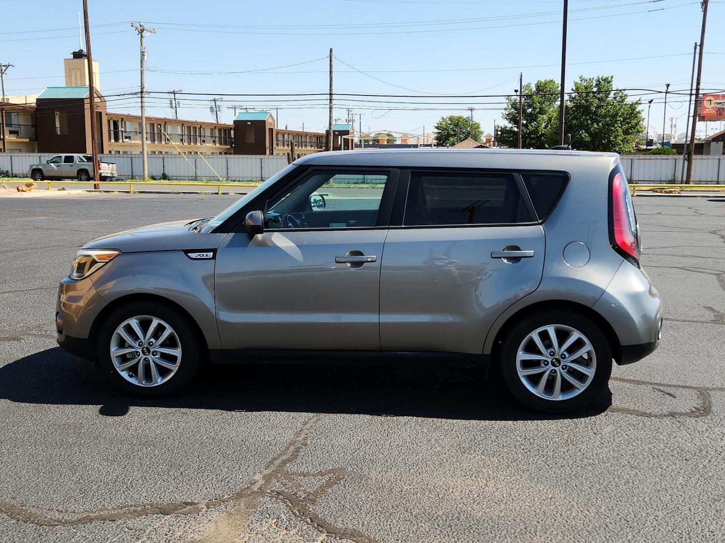 2019 Titanium Gray /Black, cloth Kia Soul + (KNDJP3A56K7) with an Engine: 2.0L GDI DOHC Dual CVVT I4 engine, located at 4711 Ave Q, Lubbock, TX, 79412, (806) 687-2362, 33.551304, -101.855293 - Photo#1