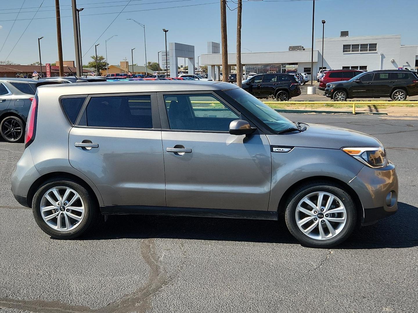 2019 Titanium Gray /Black, cloth Kia Soul + (KNDJP3A56K7) with an Engine: 2.0L GDI DOHC Dual CVVT I4 engine, located at 4711 Ave Q, Lubbock, TX, 79412, (806) 687-2362, 33.551304, -101.855293 - Photo#4