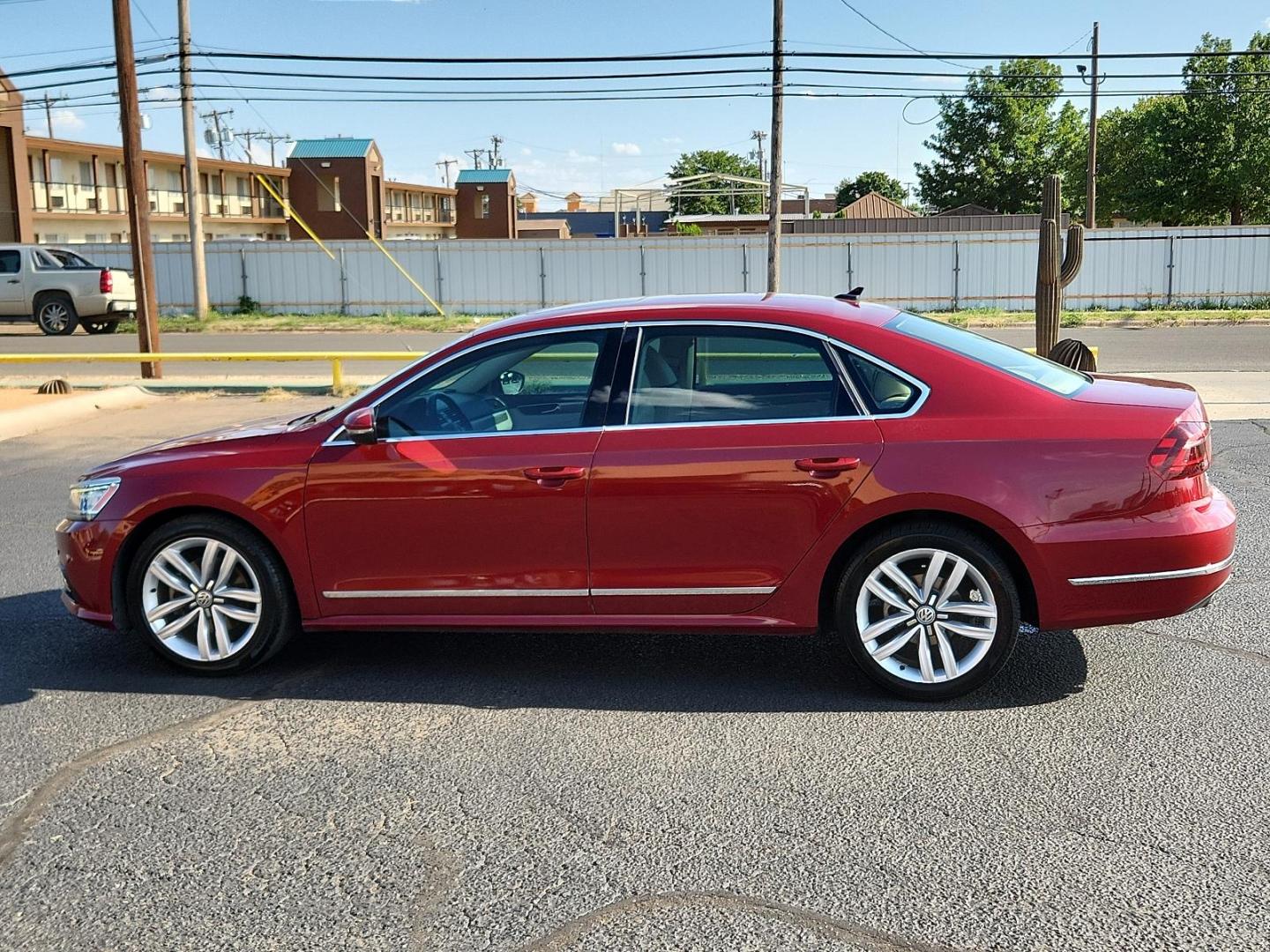 2017 Fortana Red /Titan Black, leatherette Volkswagen Passat 1.8T SE w/Technology (1VWGT7A33HC) with an Engine: 1.8L TSI 170 HP 16V Turbo 4-Cylinder -inc: direct injection engine, located at 4711 Ave Q, Lubbock, TX, 79412, (806) 687-2362, 33.551304, -101.855293 - Photo#1