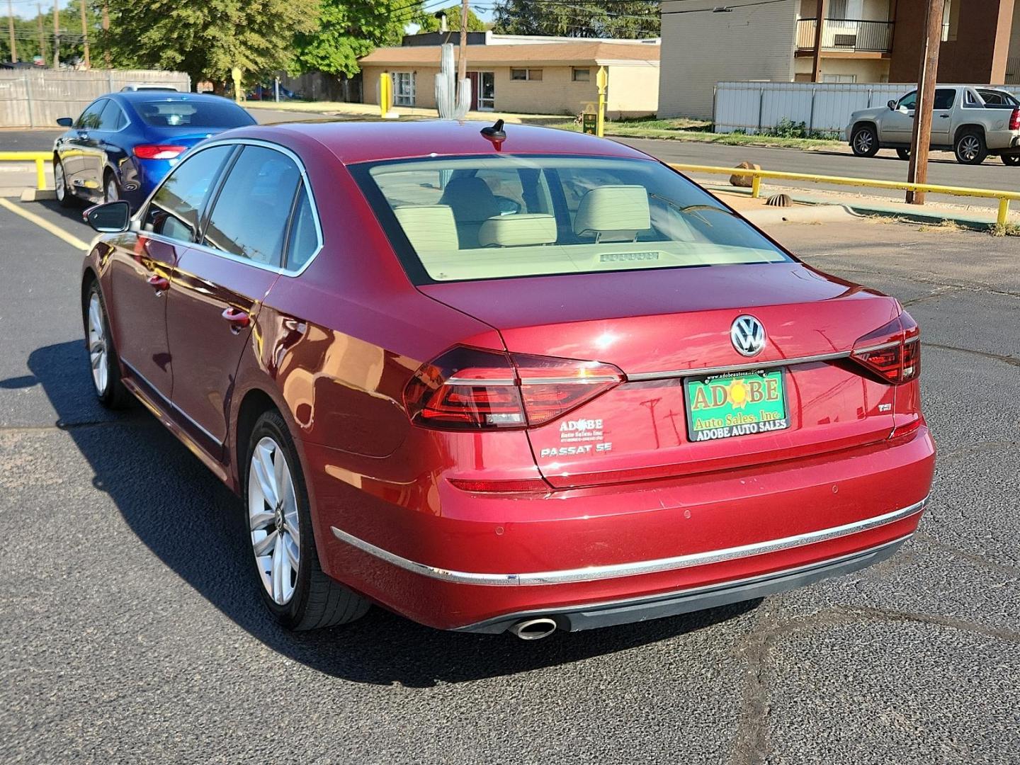 2017 Fortana Red /Titan Black, leatherette Volkswagen Passat 1.8T SE w/Technology (1VWGT7A33HC) with an Engine: 1.8L TSI 170 HP 16V Turbo 4-Cylinder -inc: direct injection engine, located at 4711 Ave Q, Lubbock, TX, 79412, (806) 687-2362, 33.551304, -101.855293 - Photo#2