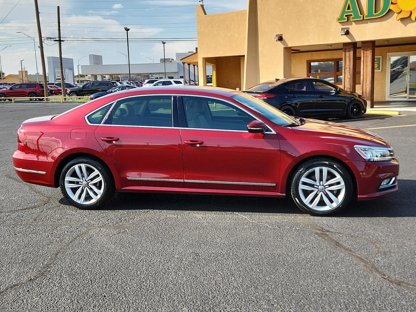 2017 Fortana Red /Titan Black, leatherette Volkswagen Passat 1.8T SE w/Technology (1VWGT7A33HC) with an Engine: 1.8L TSI 170 HP 16V Turbo 4-Cylinder -inc: direct injection engine, located at 4711 Ave Q, Lubbock, TX, 79412, (806) 687-2362, 33.551304, -101.855293 - Photo#5