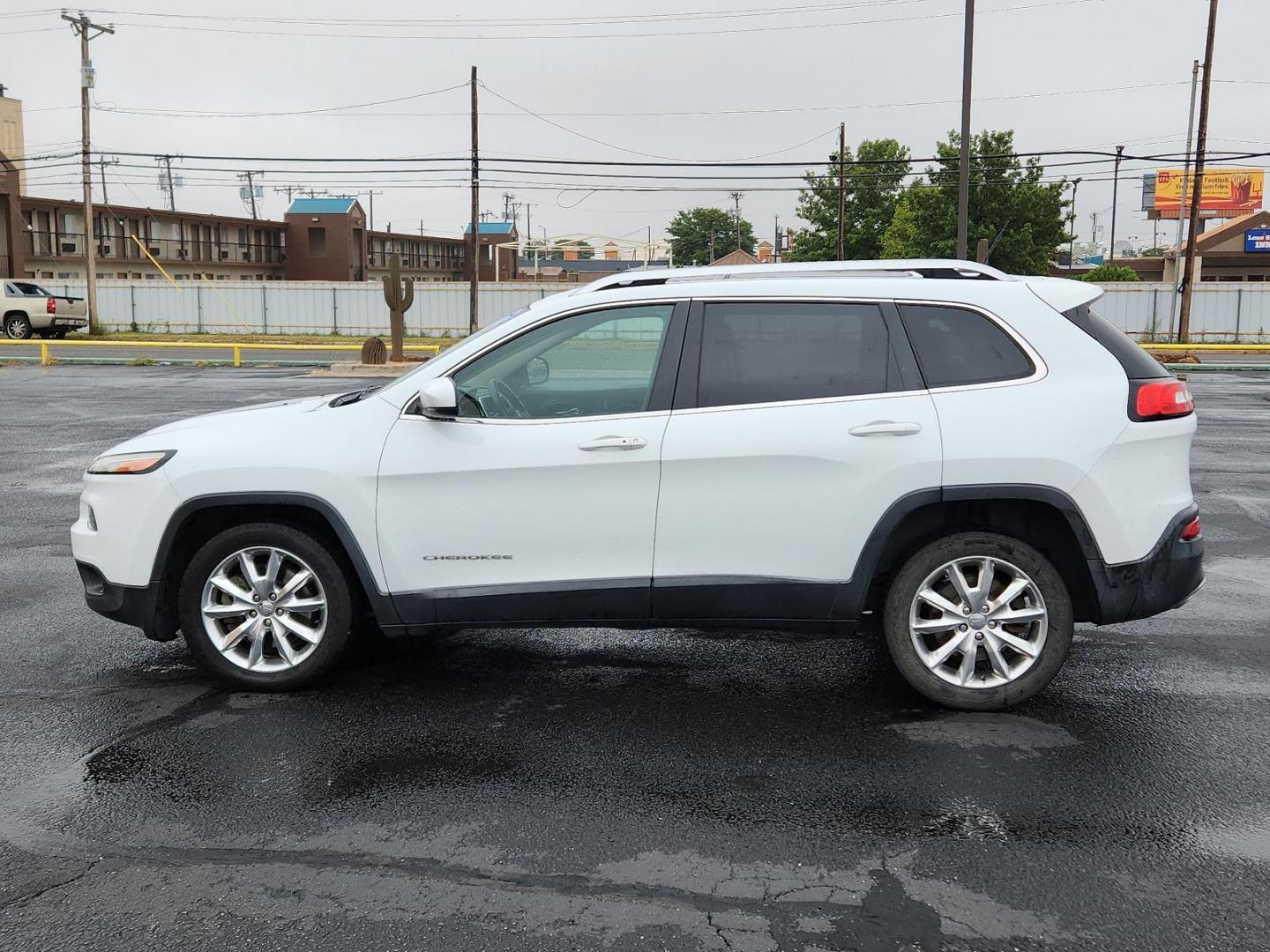 2014 Bright White Clearcoat /Black Jeep Cherokee Limited (1C4PJLDS6EW) with an ENGINE: 3.2L V6 24V VVT engine, located at 4711 Ave Q, Lubbock, TX, 79412, (806) 687-2362, 33.551304, -101.855293 - Photo#1