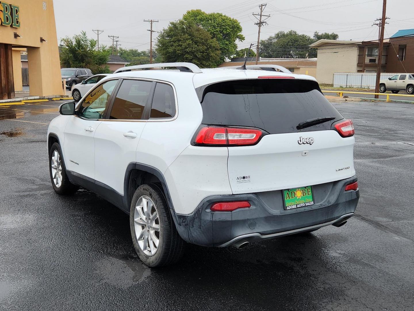 2014 Bright White Clearcoat /Black Jeep Cherokee Limited (1C4PJLDS6EW) with an ENGINE: 3.2L V6 24V VVT engine, located at 4711 Ave Q, Lubbock, TX, 79412, (806) 687-2362, 33.551304, -101.855293 - Photo#2