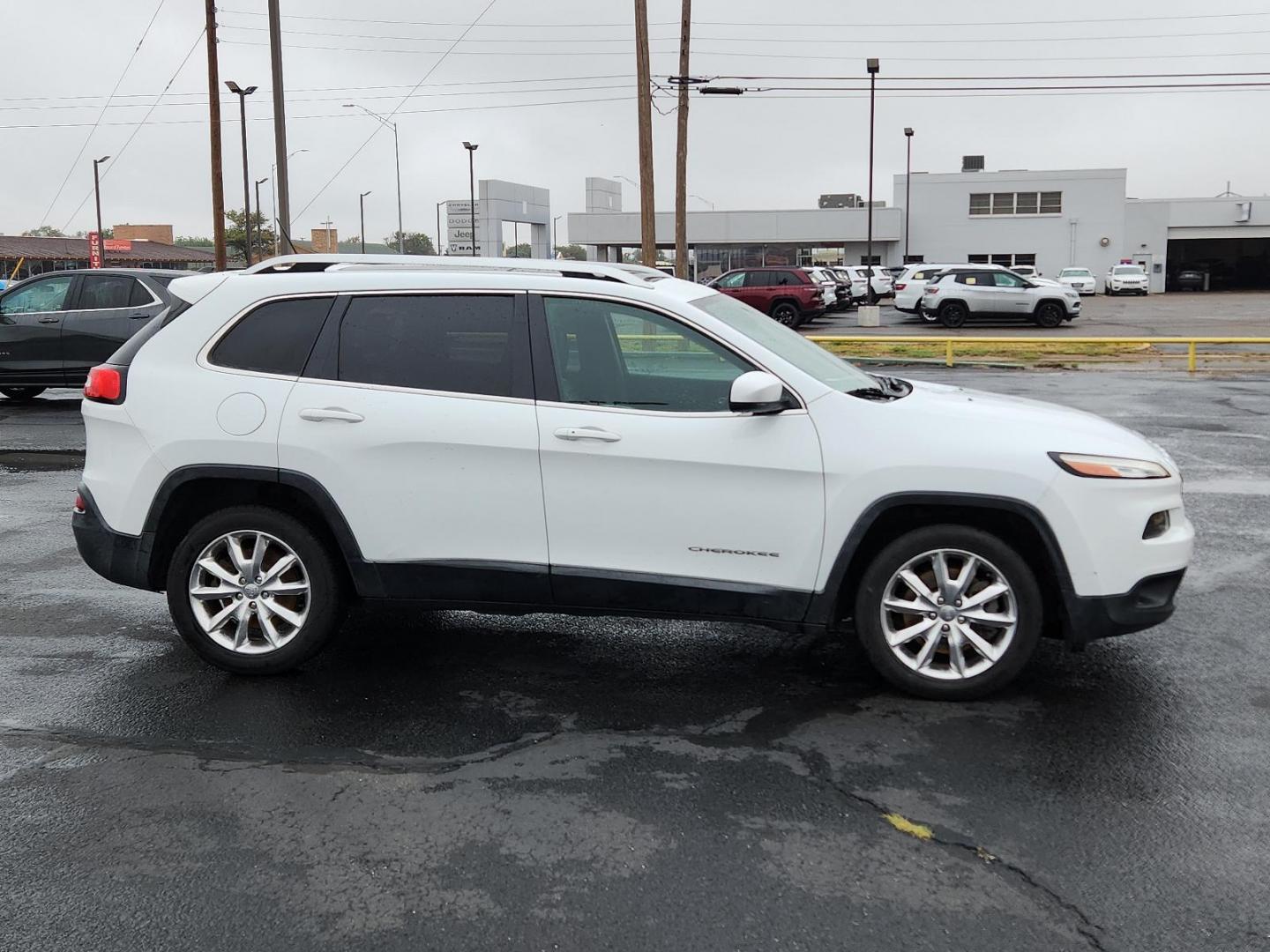 2014 Bright White Clearcoat /Black Jeep Cherokee Limited (1C4PJLDS6EW) with an ENGINE: 3.2L V6 24V VVT engine, located at 4711 Ave Q, Lubbock, TX, 79412, (806) 687-2362, 33.551304, -101.855293 - Photo#4