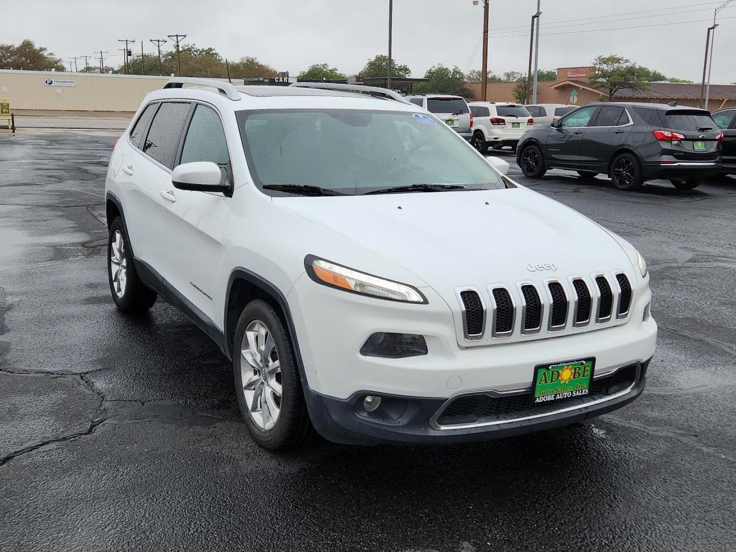 2014 Bright White Clearcoat /Black Jeep Cherokee Limited (1C4PJLDS6EW) with an ENGINE: 3.2L V6 24V VVT engine, located at 4711 Ave Q, Lubbock, TX, 79412, (806) 687-2362, 33.551304, -101.855293 - Photo#5