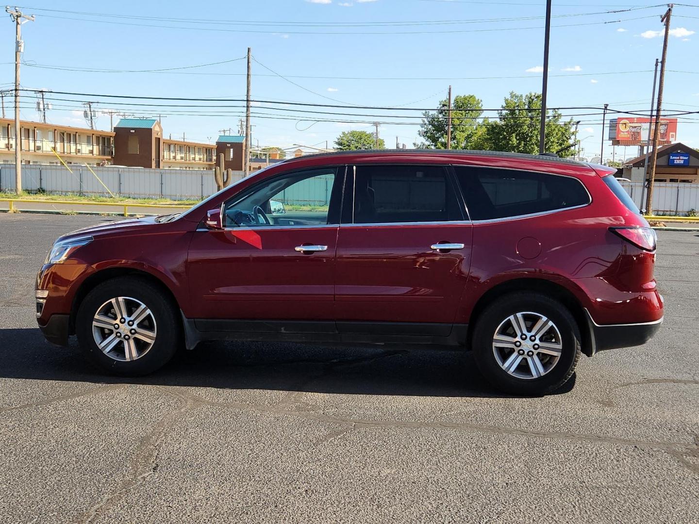 2016 Red /Gray Chevrolet Traverse LT (1GNKRHKD3GJ) with an ENGINE, 3.6L SIDI V6 engine, located at 4711 Ave Q, Lubbock, TX, 79412, (806) 687-2362, 33.551304, -101.855293 - Photo#1