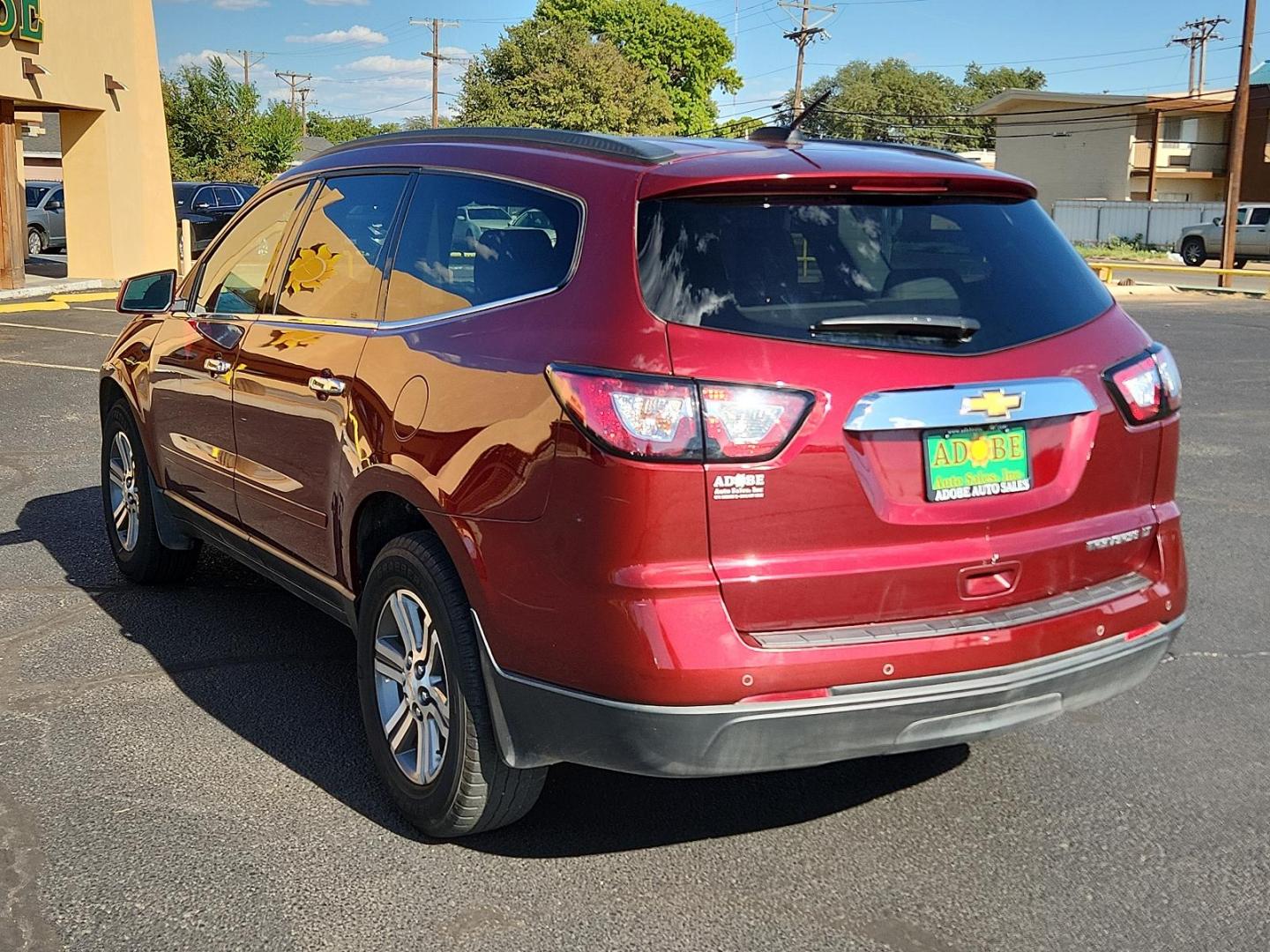 2016 Red /Gray Chevrolet Traverse LT (1GNKRHKD3GJ) with an ENGINE, 3.6L SIDI V6 engine, located at 4711 Ave Q, Lubbock, TX, 79412, (806) 687-2362, 33.551304, -101.855293 - Photo#2