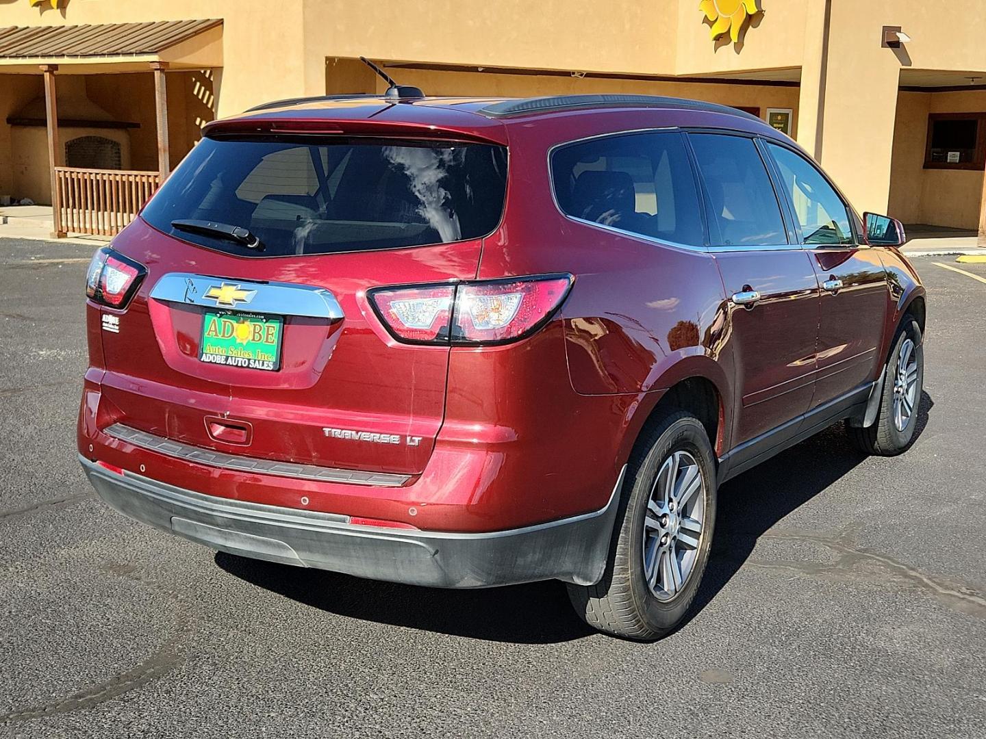 2016 Red /Gray Chevrolet Traverse LT (1GNKRHKD3GJ) with an ENGINE, 3.6L SIDI V6 engine, located at 4711 Ave Q, Lubbock, TX, 79412, (806) 687-2362, 33.551304, -101.855293 - Photo#3