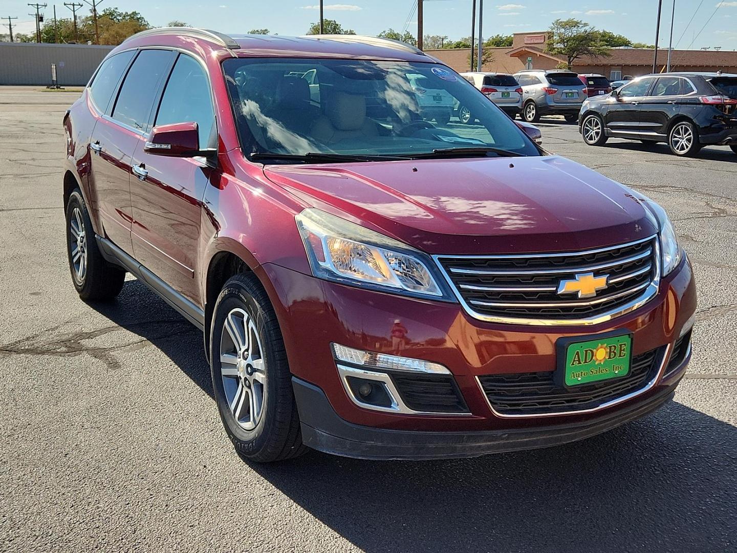 2016 Red /Gray Chevrolet Traverse LT (1GNKRHKD3GJ) with an ENGINE, 3.6L SIDI V6 engine, located at 4711 Ave Q, Lubbock, TX, 79412, (806) 687-2362, 33.551304, -101.855293 - Photo#5