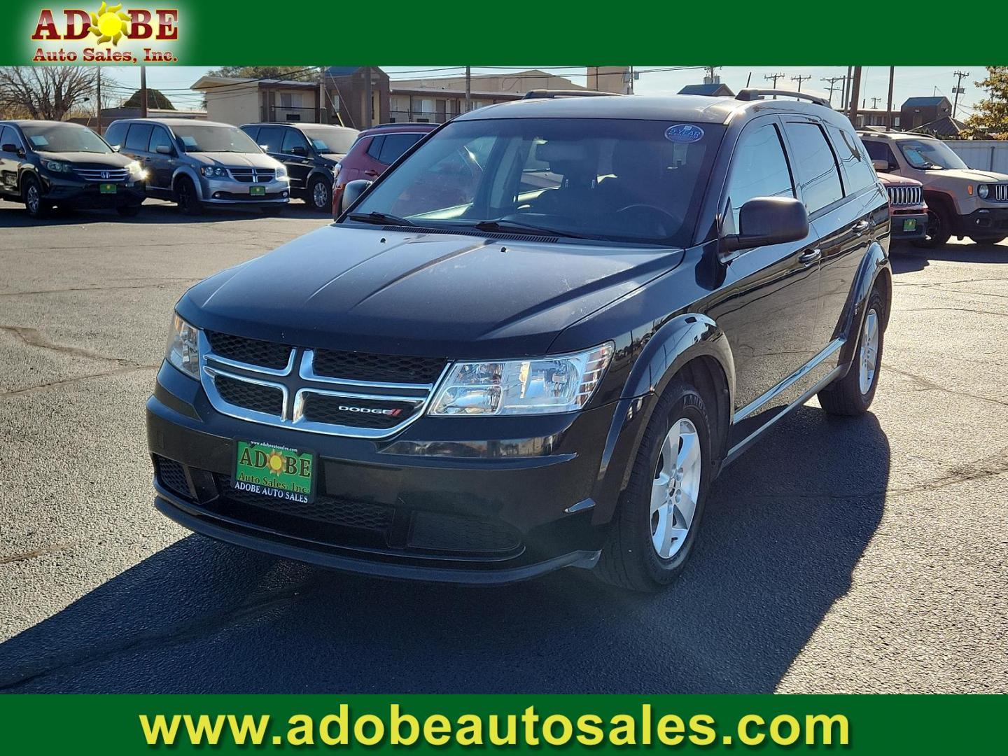 2016 Pitch Black Clear Coat Dodge Journey SE (3C4PDCAB6GT) with an ENGINE: 2.4L I4 DOHC 16V DUAL VVT engine, located at 4711 Ave Q, Lubbock, TX, 79412, (806) 687-2362, 33.551304, -101.855293 - Photo#0