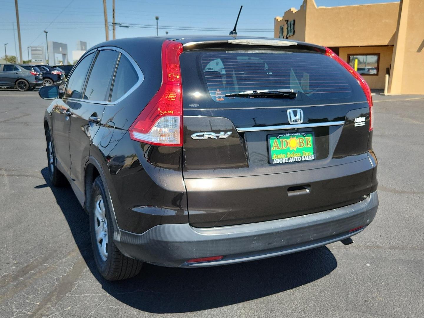 2014 Kona Coffee Metallic /Black Honda CR-V LX (2HKRM3H35EH) with an Engine: 2.4L I-4 16-Valve DOHC i-VTEC engine, located at 4711 Ave Q, Lubbock, TX, 79412, (806) 687-2362, 33.551304, -101.855293 - Photo#2