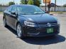 2014 Platinum Gray Metallic /Titan Black Volkswagen Passat SE w/Sunroof (1VWBT7A35EC) with an Engine: 1.8L 4-Cylinder DOHC engine, located at 4711 Ave Q, Lubbock, TX, 79412, (806) 687-2362, 33.551304, -101.855293 - Photo#5