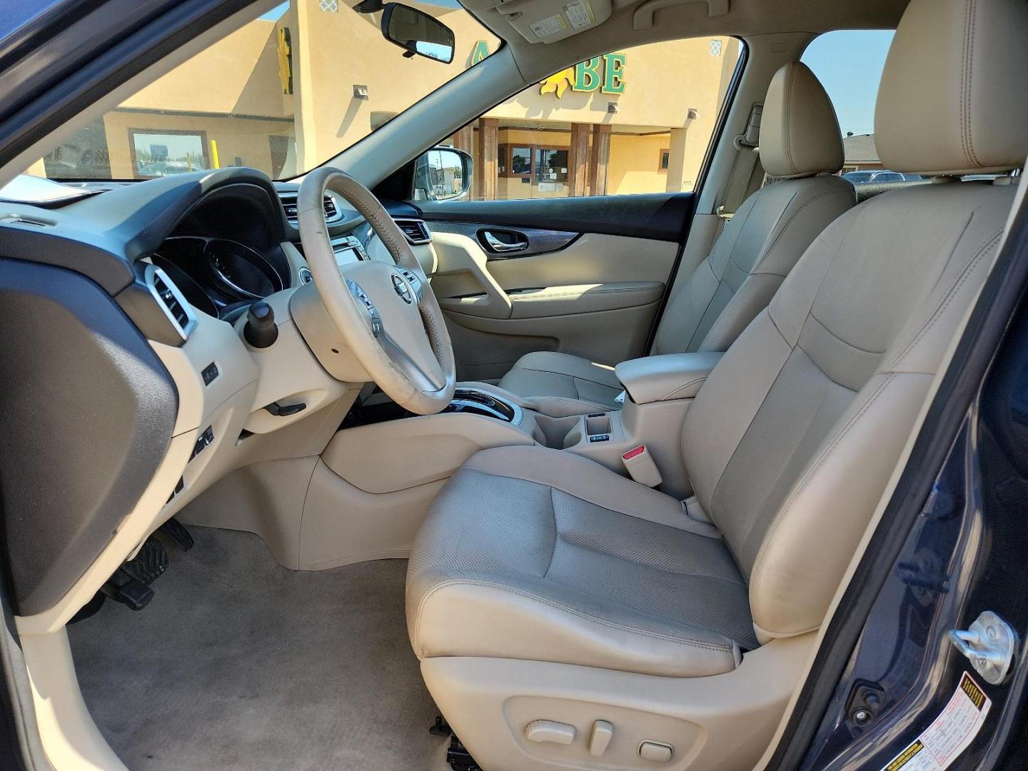 2015 Arctic Blue Metallic /Almond, leather Nissan Rogue SL (5N1AT2MT7FC) with an Engine: 2.5L DOHC 16-Valve I4 -inc: ECO mode engine, located at 4711 Ave Q, Lubbock, TX, 79412, (806) 687-2362, 33.551304, -101.855293 - Photo#13