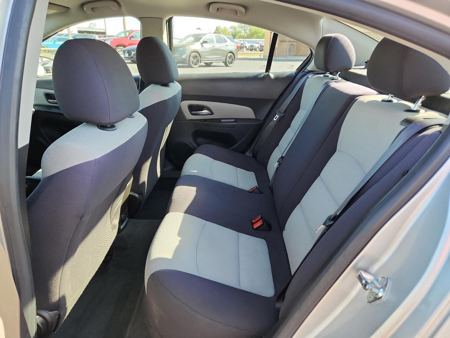 2015 Silver Ice Metallic /Jet Black/Medium Titanium, premium cloth Chevrolet Cruze LS (1G1PA5SG4F7) with an ENGINE, ECOTEC 1.8L VARIABLE VALVE TIMING DOHC 4-CYLINDER SEQUENTIAL MFI engine, located at 4711 Ave Q, Lubbock, TX, 79412, (806) 687-2362, 33.551304, -101.855293 - Photo#7