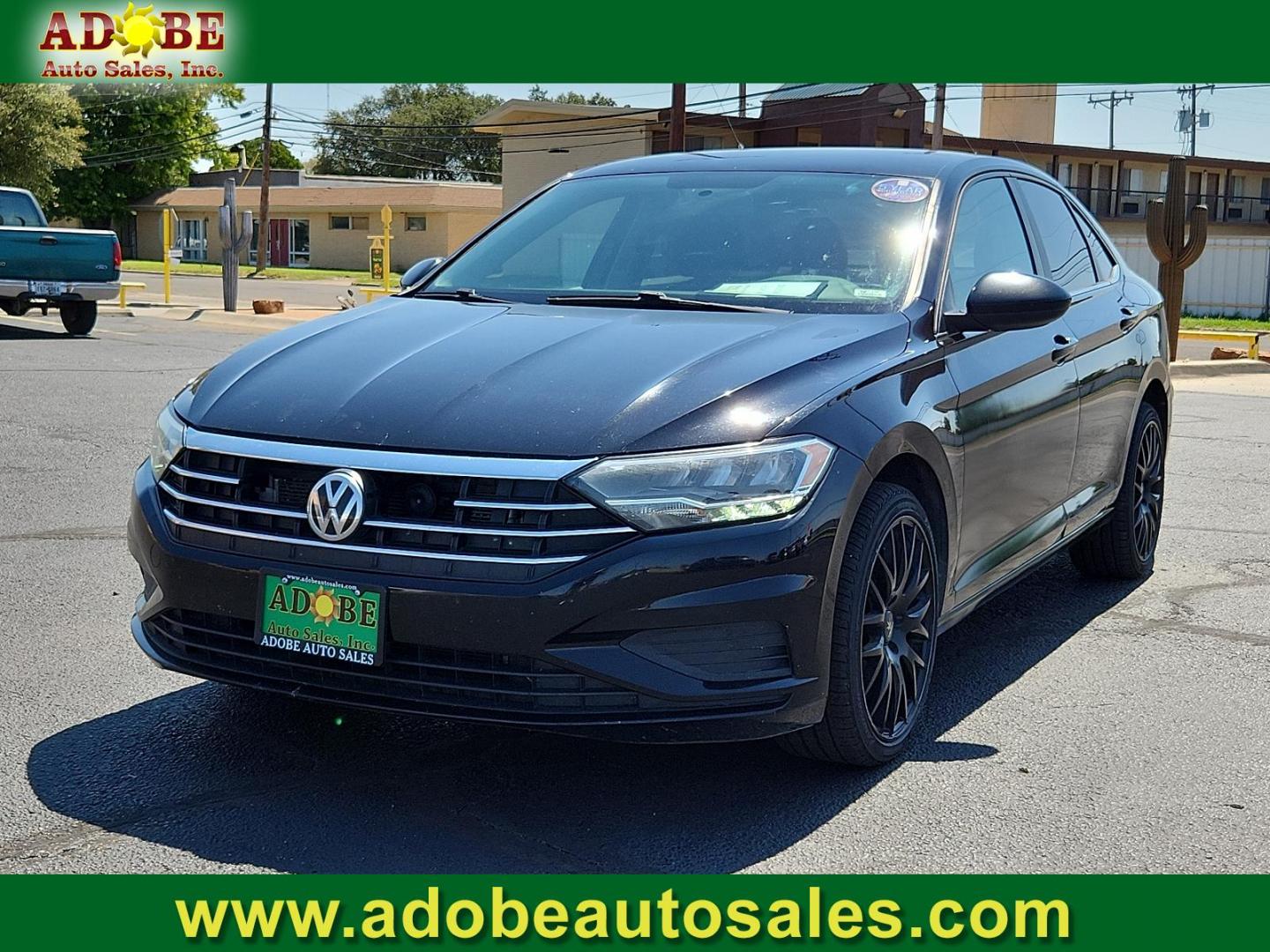 2019 Black Uni /Titan Black, cloth Volkswagen Jetta SE (3VWC57BU8KM) with an Engine: 1.4L TSI I-4 Turbocharged -inc: DOHC 16-valve, direct fuel injection engine, located at 4711 Ave Q, Lubbock, TX, 79412, (806) 687-2362, 33.551304, -101.855293 - Photo#0