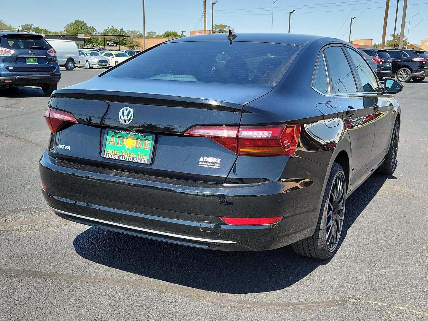 2019 Black Uni /Titan Black, cloth Volkswagen Jetta SE (3VWC57BU8KM) with an Engine: 1.4L TSI I-4 Turbocharged -inc: DOHC 16-valve, direct fuel injection engine, located at 4711 Ave Q, Lubbock, TX, 79412, (806) 687-2362, 33.551304, -101.855293 - Photo#3