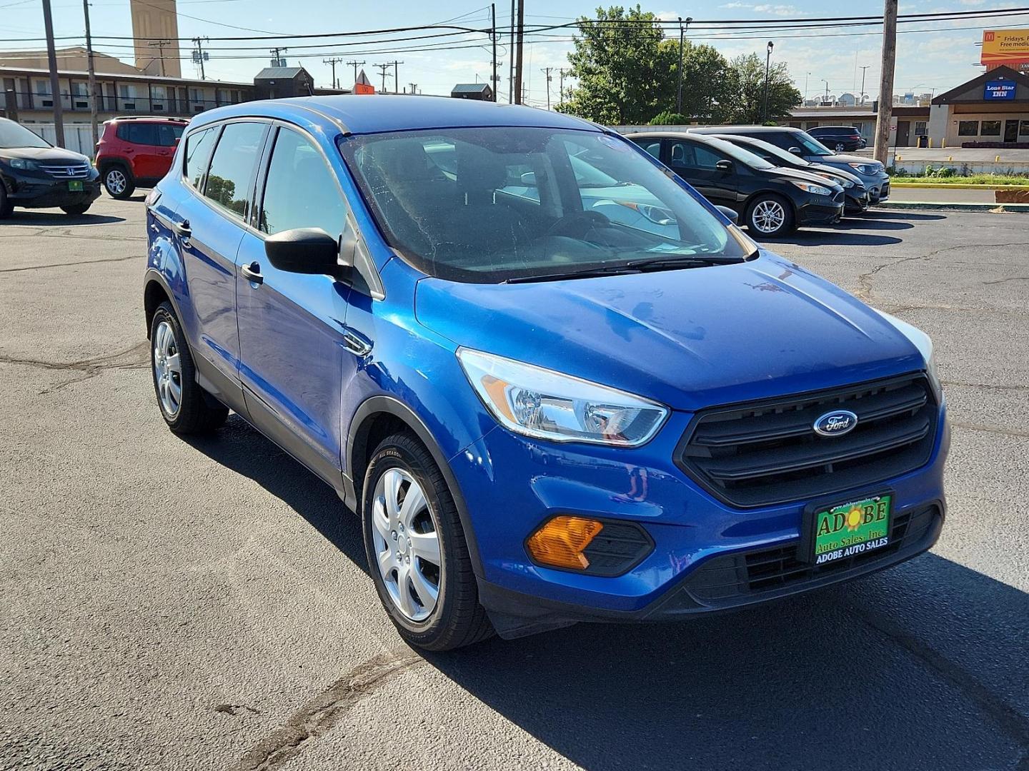 2017 Lightning Blue Metallic /Charcoal Black, cloth Ford Escape S (1FMCU0F73HU) with an 2.5L L4 DOHC 16V engine, located at 4711 Ave Q, Lubbock, TX, 79412, (806) 687-2362, 33.551304, -101.855293 - Photo#5