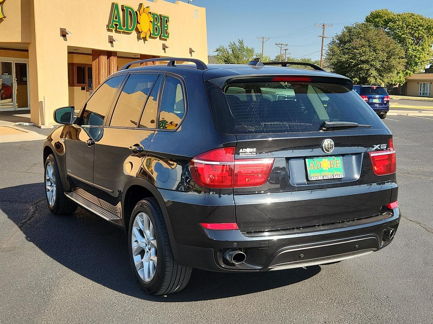 2011 Black Sapphire Metallic - 475 /Black - KCSW BMW X5 35i (5UXZV4C52BL) with an 3.0-liter, 300-horsepower, 24-valve inline 6-cylinder dual overhead cam (DOHC) engine with TwinPower Turbo technology, Valvetronic, piezo direct fuel injection, and Double-VANOS steplessly variable valve timing engine, located at 4711 Ave Q, Lubbock, TX, 79412, (806) 687-2362, 33.551304, -101.855293 - Photo#2