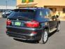 2011 Black Sapphire Metallic - 475 /Black - KCSW BMW X5 35i (5UXZV4C52BL) with an 3.0-liter, 300-horsepower, 24-valve inline 6-cylinder dual overhead cam (DOHC) engine with TwinPower Turbo technology, Valvetronic, piezo direct fuel injection, and Double-VANOS steplessly variable valve timing engine, located at 4711 Ave Q, Lubbock, TX, 79412, (806) 687-2362, 33.551304, -101.855293 - Photo#3