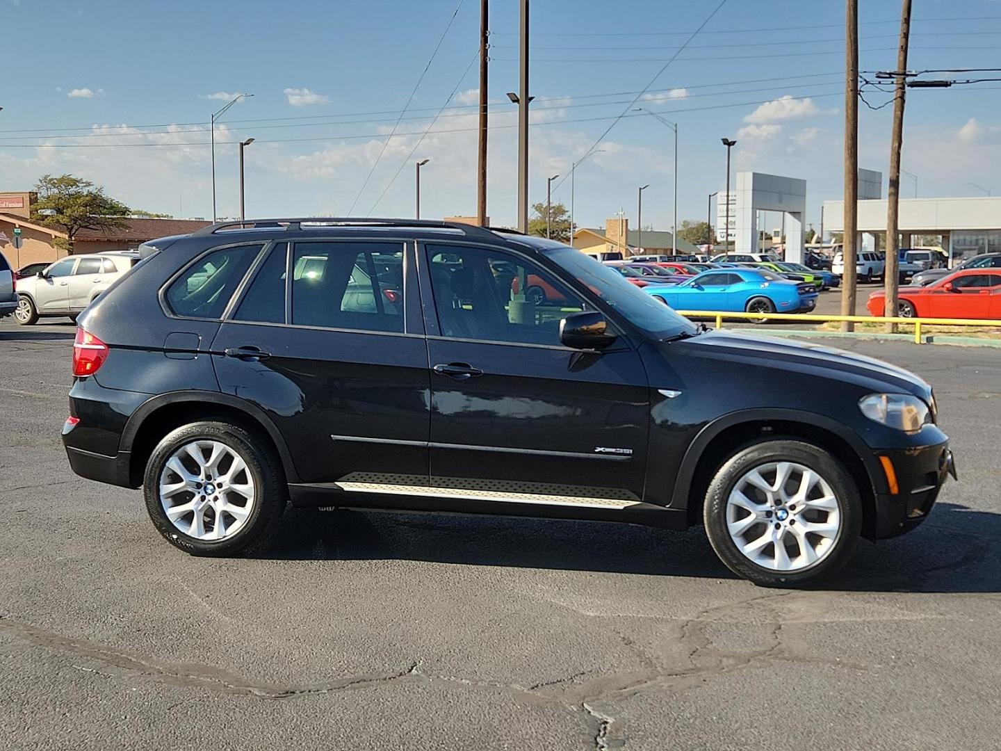 2011 Black Sapphire Metallic - 475 /Black - KCSW BMW X5 35i (5UXZV4C52BL) with an 3.0-liter, 300-horsepower, 24-valve inline 6-cylinder dual overhead cam (DOHC) engine with TwinPower Turbo technology, Valvetronic, piezo direct fuel injection, and Double-VANOS steplessly variable valve timing engine, located at 4711 Ave Q, Lubbock, TX, 79412, (806) 687-2362, 33.551304, -101.855293 - Photo#4