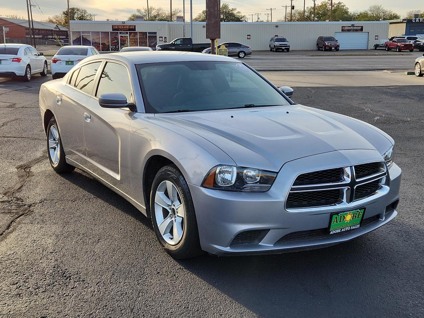 2014 Billet Silver Metallic CC Dodge Charger SE (2C3CDXBG1EH) with an ENGINE: 3.6L V6 24V VVT engine, located at 4711 Ave Q, Lubbock, TX, 79412, (806) 687-2362, 33.551304, -101.855293 - Photo#1