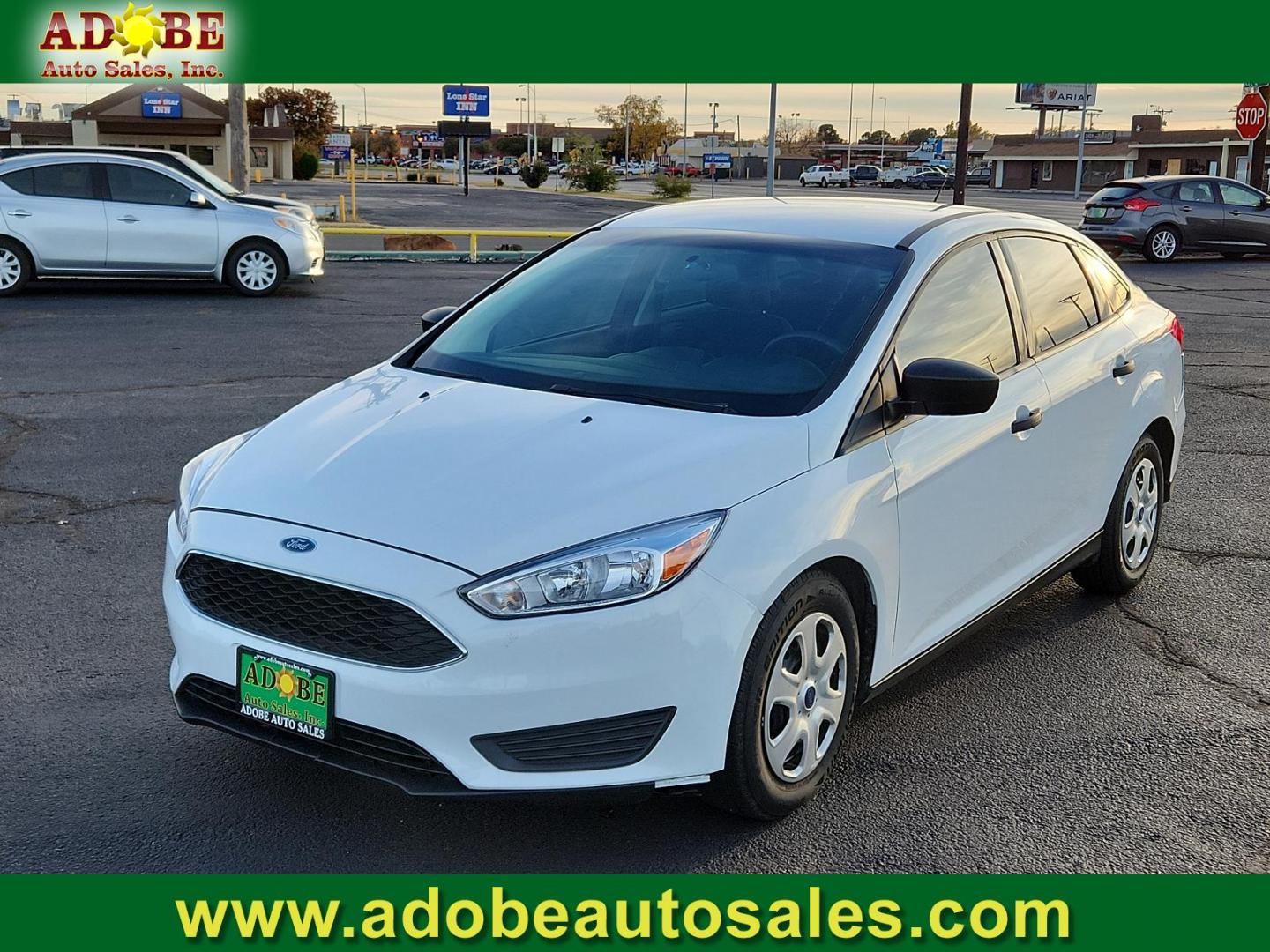 2017 Oxford White - YZ /Charcoal Black - YW Ford Focus S (1FADP3E20HL) with an ENGINE: 2.0L I-4 GDI TI-VCT FLEX FUEL engine, located at 4711 Ave Q, Lubbock, TX, 79412, (806) 687-2362, 33.551304, -101.855293 - Photo#0