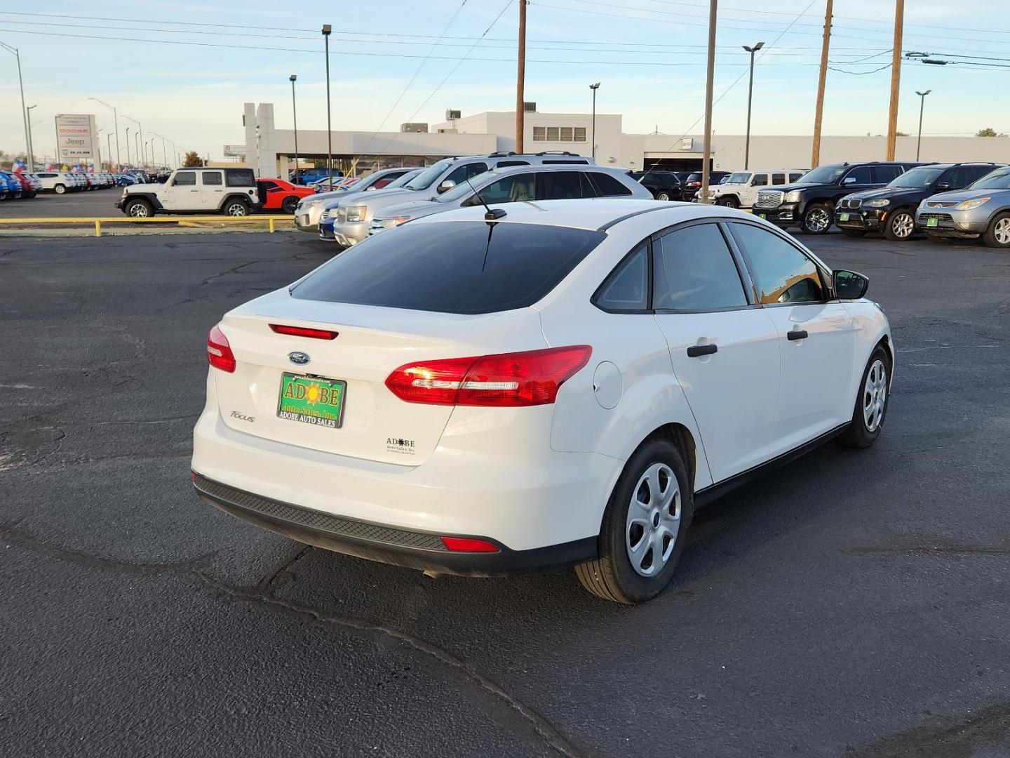 2017 Oxford White - YZ /Charcoal Black - YW Ford Focus S (1FADP3E20HL) with an ENGINE: 2.0L I-4 GDI TI-VCT FLEX FUEL engine, located at 4711 Ave Q, Lubbock, TX, 79412, (806) 687-2362, 33.551304, -101.855293 - Photo#3