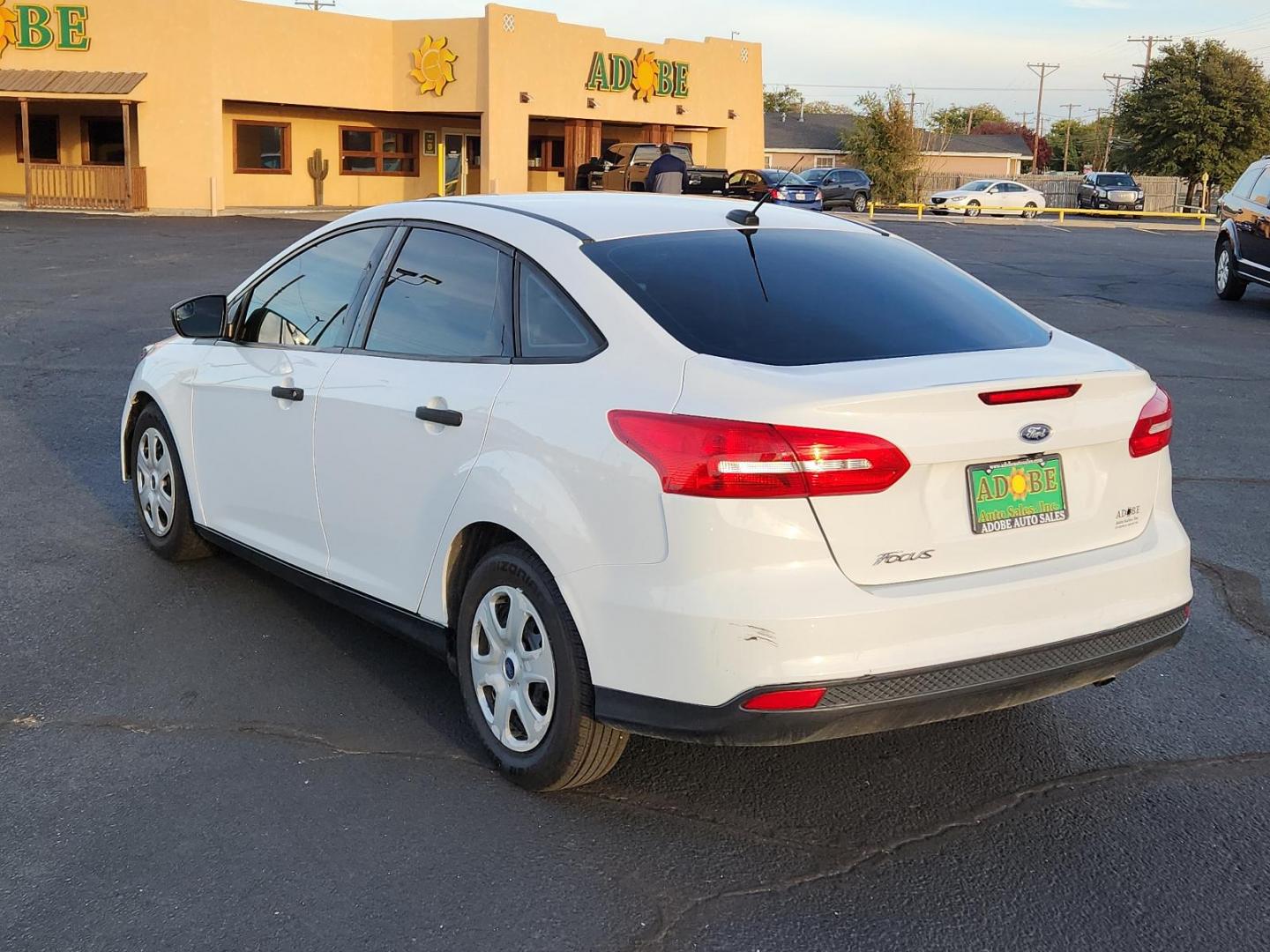 2017 Oxford White - YZ /Charcoal Black - YW Ford Focus S (1FADP3E20HL) with an ENGINE: 2.0L I-4 GDI TI-VCT FLEX FUEL engine, located at 4711 Ave Q, Lubbock, TX, 79412, (806) 687-2362, 33.551304, -101.855293 - Photo#4