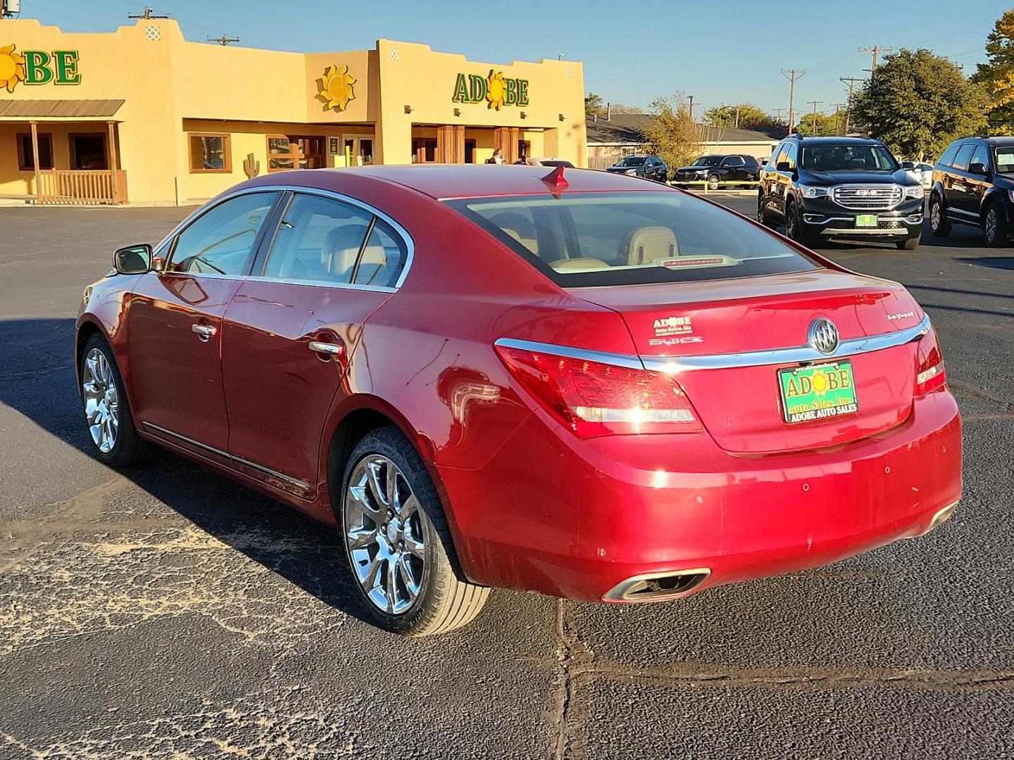 2014 Crystal Red Tintcoat Buick LaCrosse Leather (1G4GB5G36EF) with an ENGINE, 3.6L SIDI DOHC V6 VVT engine, located at 4711 Ave Q, Lubbock, TX, 79412, (806) 687-2362, 33.551304, -101.855293 - Photo#2