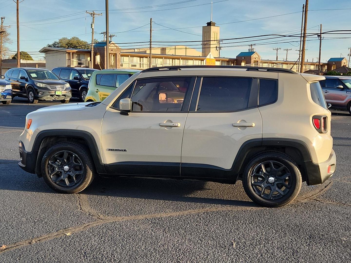 2015 Tan /Gray Jeep Renegade SPORT UTILITY 4-DR (ZACCJABT0FP) , located at 4711 Ave Q, Lubbock, TX, 79412, (806) 687-2362, 33.551304, -101.855293 - Photo#1