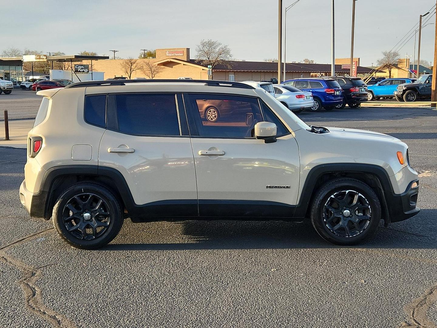 2015 Tan /Gray Jeep Renegade SPORT UTILITY 4-DR (ZACCJABT0FP) , located at 4711 Ave Q, Lubbock, TX, 79412, (806) 687-2362, 33.551304, -101.855293 - Photo#4