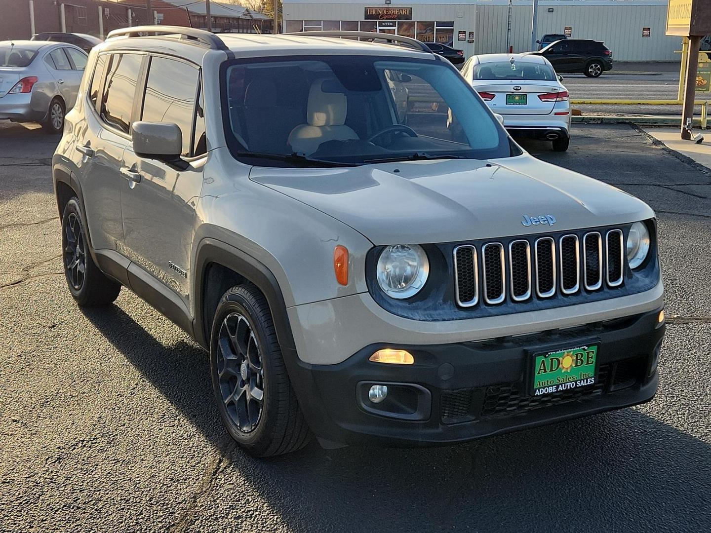 2015 Tan /Gray Jeep Renegade SPORT UTILITY 4-DR (ZACCJABT0FP) , located at 4711 Ave Q, Lubbock, TX, 79412, (806) 687-2362, 33.551304, -101.855293 - Photo#5