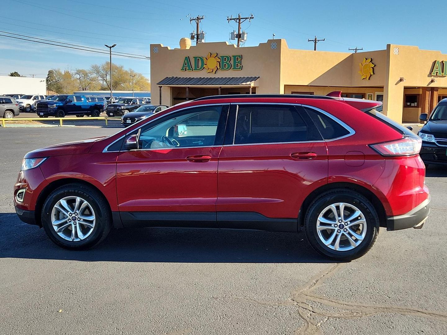 2016 Ruby Red Metallic Tinted Clearcoat Ford Edge SEL (2FMPK3J88GB) with an ENGINE: 3.5L TI-VCT V6 engine, located at 4711 Ave Q, Lubbock, TX, 79412, (806) 687-2362, 33.551304, -101.855293 - Photo#1