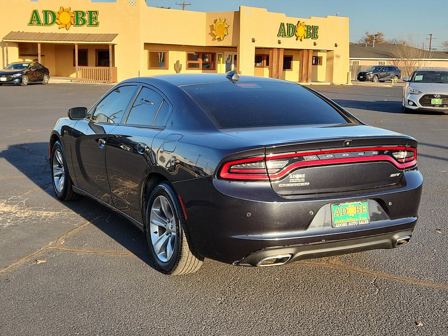 2018 Maximum Steel Metallic Clear Coat Dodge Charger SXT Plus (2C3CDXHG0JH) with an ENGINE: 3.6L V6 24V VVT engine, located at 4711 Ave Q, Lubbock, TX, 79412, (806) 687-2362, 33.551304, -101.855293 - Photo#2