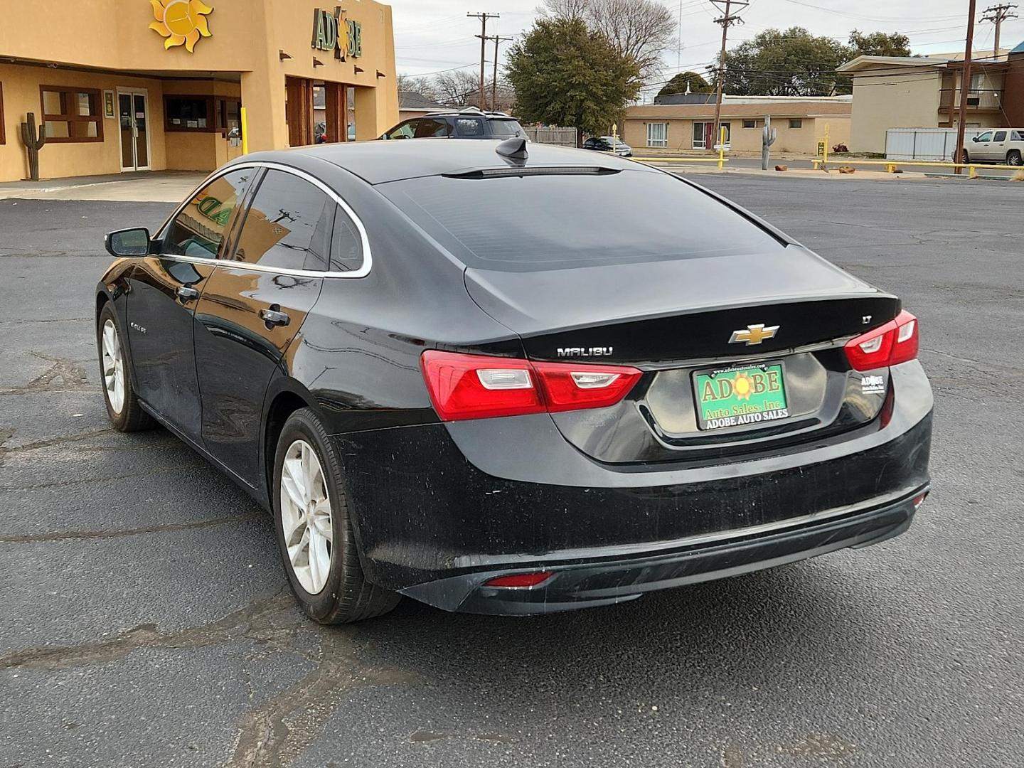 2016 BLACK Chevrolet Malibu LT (1G1ZE5STXGF) with an ENGINE, 1.5L TURBO DOHC 4-CYLINDER DI engine, located at 4711 Ave Q, Lubbock, TX, 79412, (806) 687-2362, 33.551304, -101.855293 - Photo#2