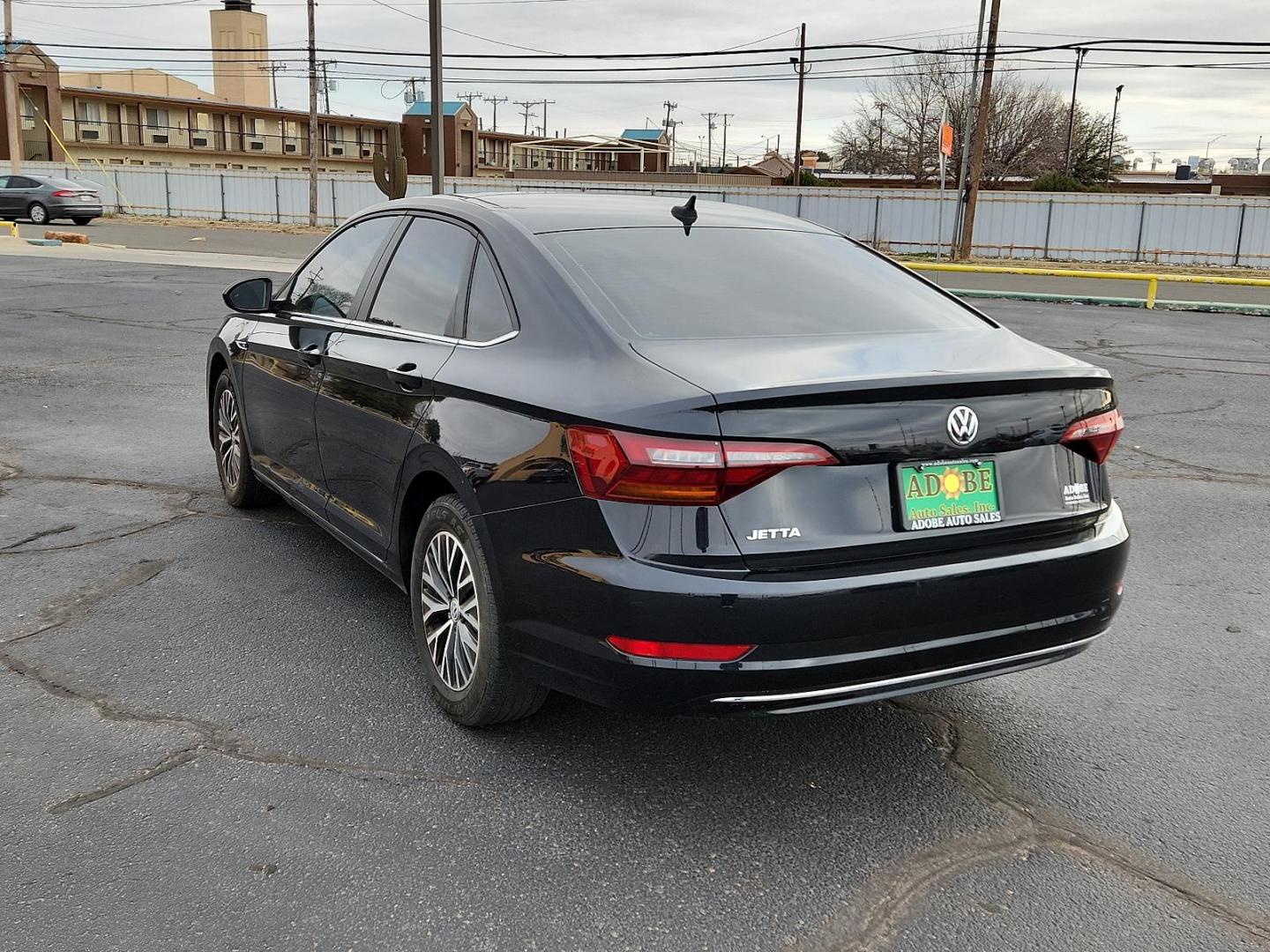 2019 BLACK Volkswagen Jetta SEL (3VWE57BUXKM) with an Engine: 1.4L TSI I-4 Turbocharged -inc: DOHC 16-valve, direct fuel injection engine, located at 4711 Ave Q, Lubbock, TX, 79412, (806) 687-2362, 33.551304, -101.855293 - Photo#2