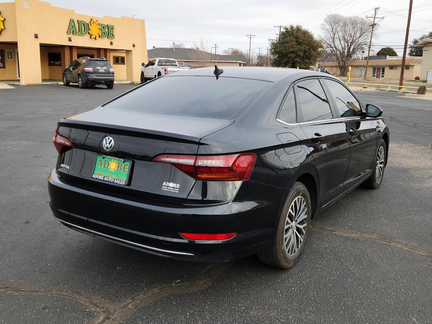 2019 BLACK Volkswagen Jetta SEL (3VWE57BUXKM) with an Engine: 1.4L TSI I-4 Turbocharged -inc: DOHC 16-valve, direct fuel injection engine, located at 4711 Ave Q, Lubbock, TX, 79412, (806) 687-2362, 33.551304, -101.855293 - Photo#3