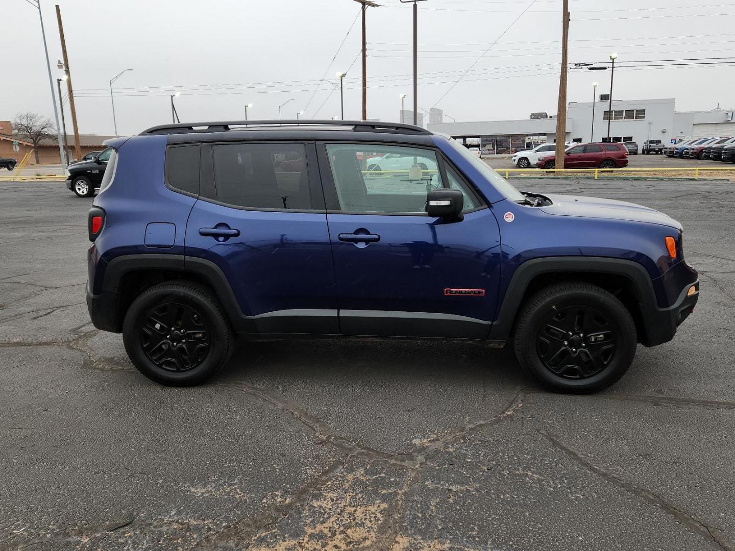 2018 BLUE Jeep Renegade Trailhawk (ZACCJBCB5JP) with an ENGINE: 2.4L I4 ZERO EVAP M-AIR engine, located at 4711 Ave Q, Lubbock, TX, 79412, (806) 687-2362, 33.551304, -101.855293 - Photo#4