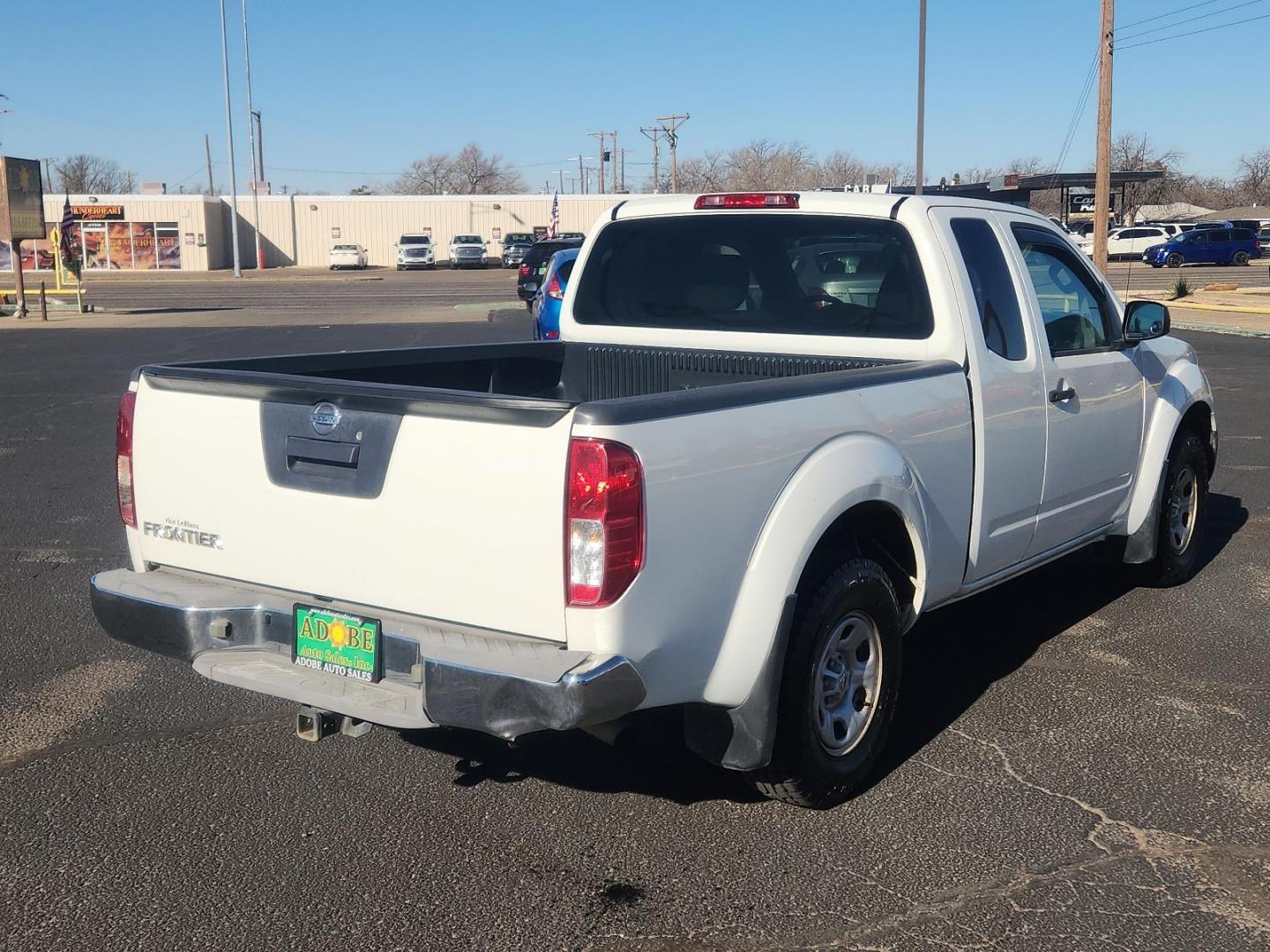 2016 WHITE Nissan Frontier S (1N6BD0CT6GN) with an Engine: 2.5L DOHC I4 engine, located at 4711 Ave Q, Lubbock, TX, 79412, (806) 687-2362, 33.551304, -101.855293 - Photo#3