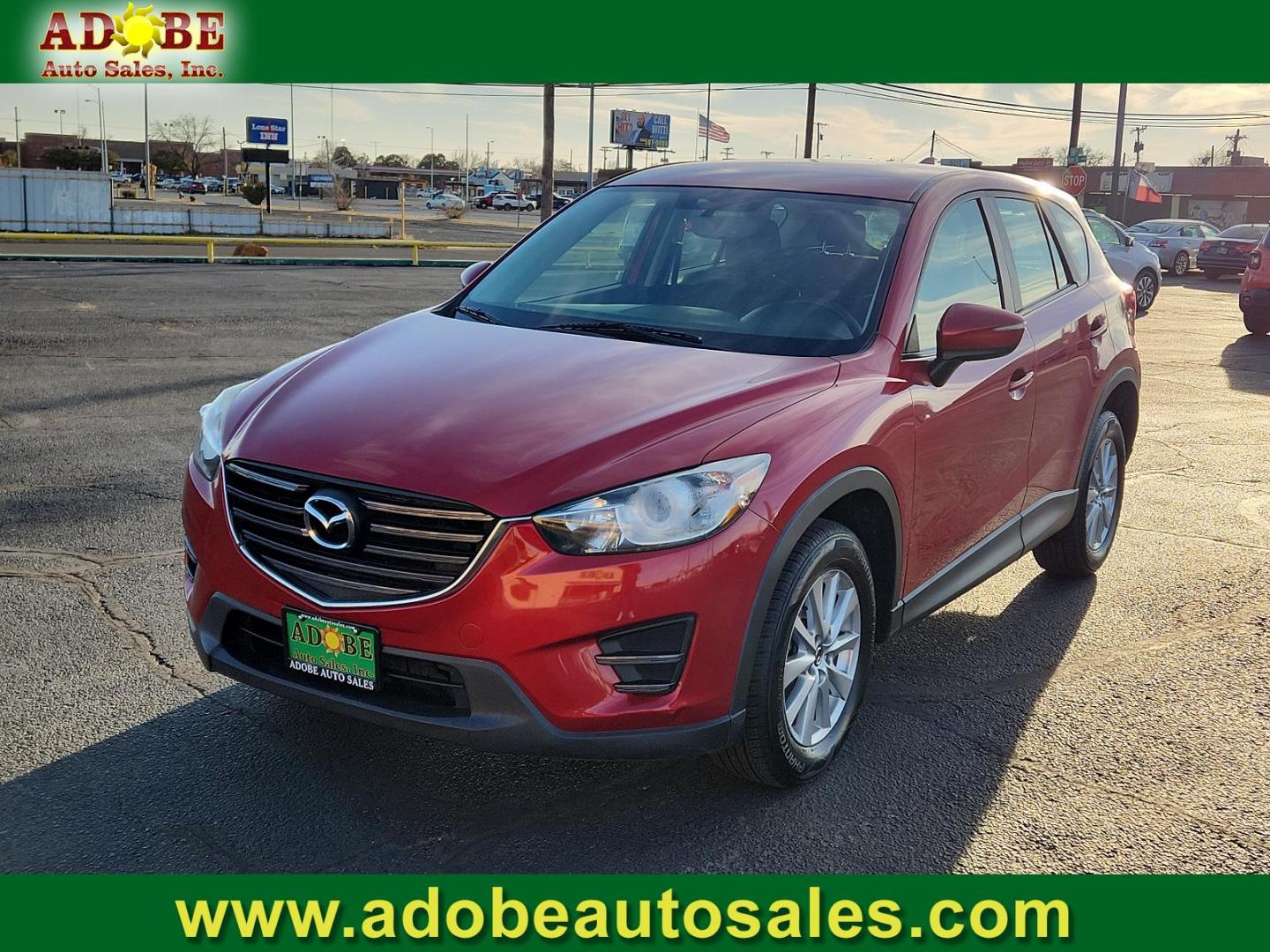 2016 RED Mazda CX-5 Sport (JM3KE2BY4G0) with an Engine: 2.5L SKYACTIV-G DOHC 16-Valve 4-Cylinder engine, located at 4711 Ave Q, Lubbock, TX, 79412, (806) 687-2362, 33.551304, -101.855293 - Photo#0