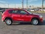 2016 RED Mazda CX-5 Sport (JM3KE2BY4G0) with an Engine: 2.5L SKYACTIV-G DOHC 16-Valve 4-Cylinder engine, located at 4711 Ave Q, Lubbock, TX, 79412, (806) 687-2362, 33.551304, -101.855293 - Photo#4