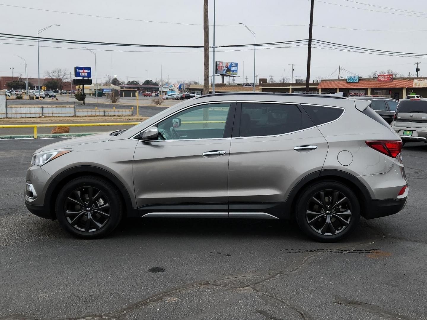 2018 GRAY Hyundai Santa Fe Sport 2.0T Ultimate (5XYZW4LA7JG) with an Engine: 2.0L Turbo-GDI DOHC 16-Valve I4 engine, located at 4711 Ave Q, Lubbock, TX, 79412, (806) 687-2362, 33.551304, -101.855293 - Photo#1