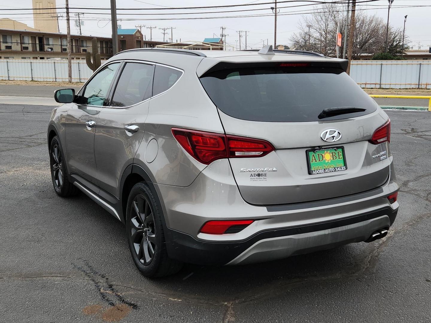 2018 GRAY Hyundai Santa Fe Sport 2.0T Ultimate (5XYZW4LA7JG) with an Engine: 2.0L Turbo-GDI DOHC 16-Valve I4 engine, located at 4711 Ave Q, Lubbock, TX, 79412, (806) 687-2362, 33.551304, -101.855293 - Photo#2