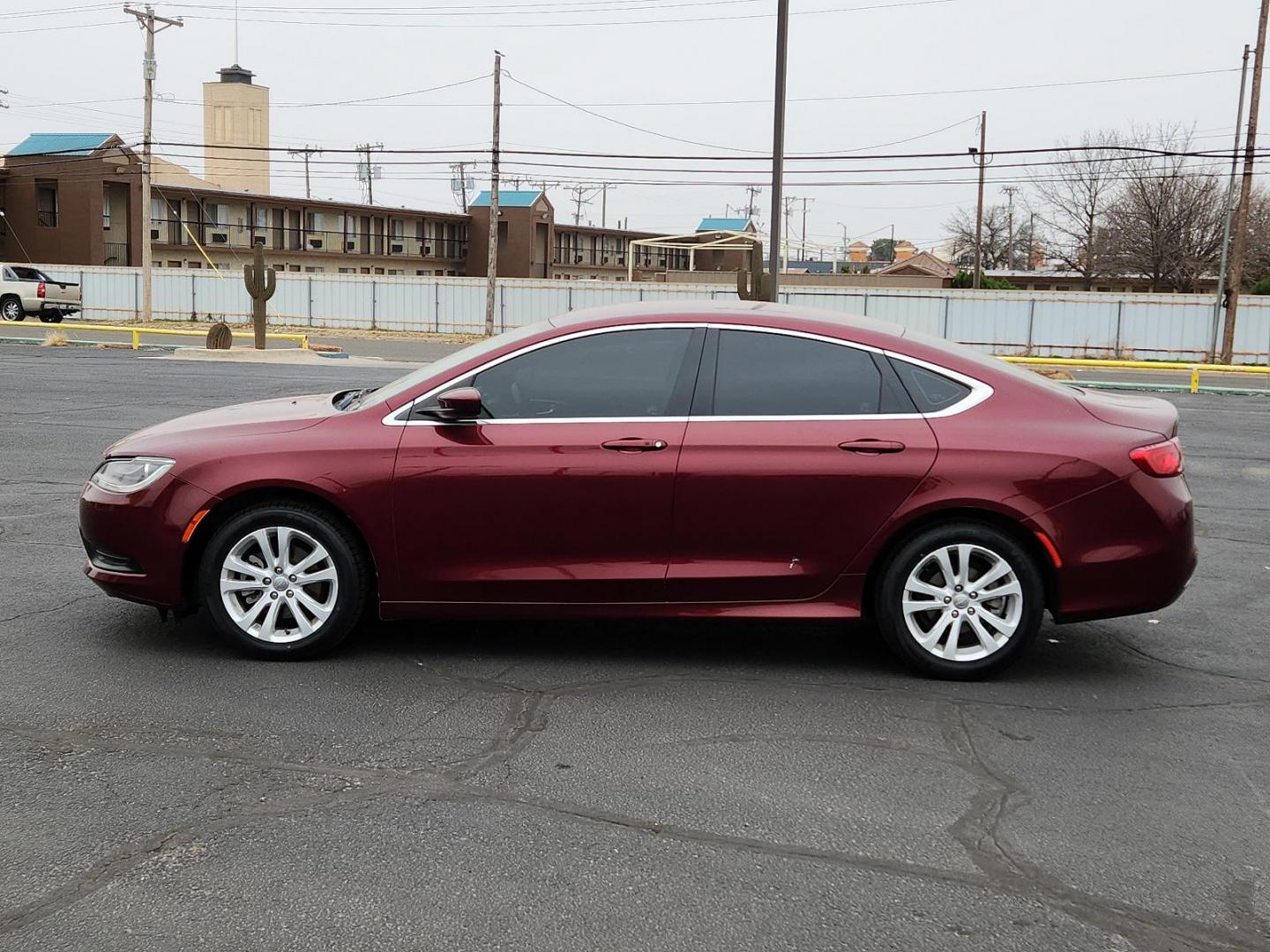 2016 RED Chrysler 200 Touring (1C3CCCFB8GN) with an ENGINE: 2.4L I4 MULTIAIR engine, located at 4711 Ave Q, Lubbock, TX, 79412, (806) 687-2362, 33.551304, -101.855293 - Photo#1