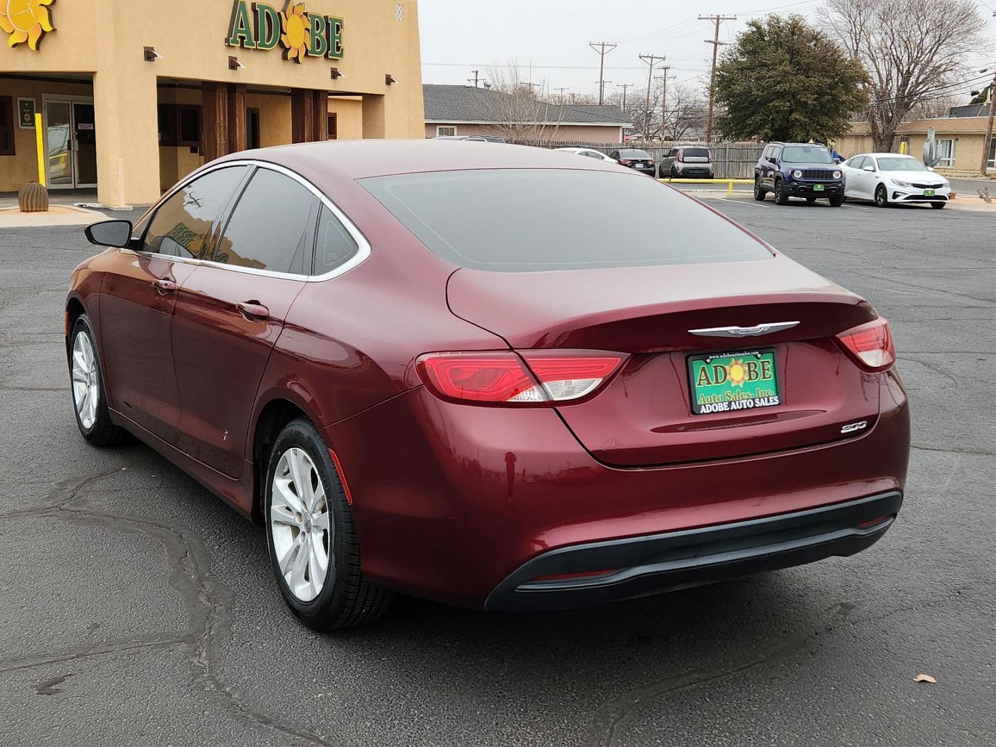 2016 RED Chrysler 200 Touring (1C3CCCFB8GN) with an ENGINE: 2.4L I4 MULTIAIR engine, located at 4711 Ave Q, Lubbock, TX, 79412, (806) 687-2362, 33.551304, -101.855293 - Photo#2