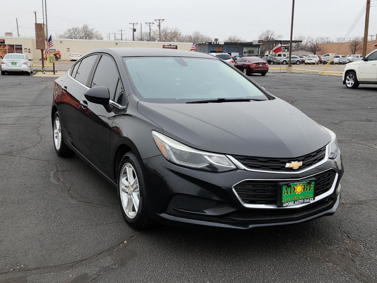 2016 BLACK Chevrolet Cruze LT (1G1BE5SM6G7) with an ENGINE, 1.4L TURBO DOHC 4-CYLINDER DI engine, located at 4711 Ave Q, Lubbock, TX, 79412, (806) 687-2362, 33.551304, -101.855293 - Photo#5