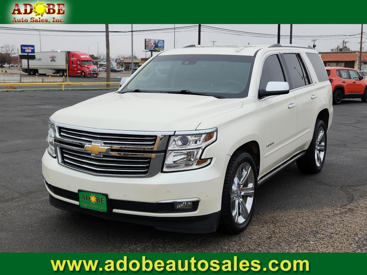 2015 WHITE Chevrolet Tahoe LTZ (1GNSCCKCXFR) with an ENGINE, 5.3L ECOTEC3 V8 WITH ACTIVE FUEL MANAGEMENT, DIRECT INJECTION AND VARIABLE VALVE TIMING engine, located at 4711 Ave Q, Lubbock, TX, 79412, (806) 687-2362, 33.551304, -101.855293 - Photo#0